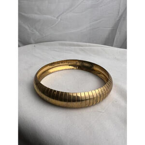 Vintage gold toned quiet luxury bangle bracelet